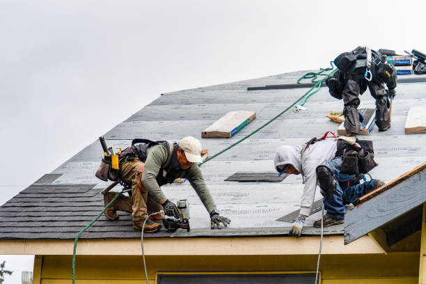 Professional Gutter Installation technician working in Bristol, VT